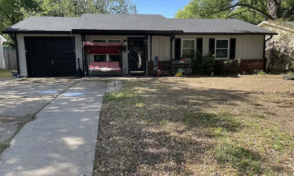 Asphalt Shingle Roof Repair crew at work on a residential roof in Northchase